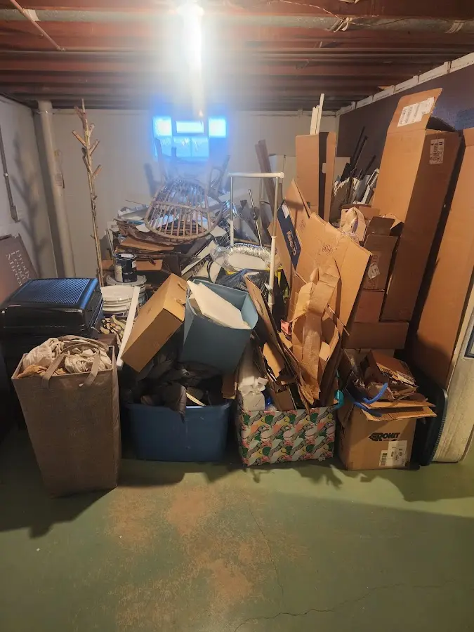 Roll-off dumpster container at job site for Concrete Dumpster Rental in Woodson Terrace